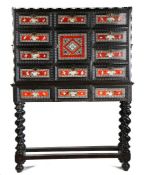 An Antwerp style ebonised ripple moulded and tortoise shell cabinet on stand, the rectangular top