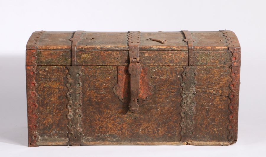 An 18th Century trunk, the arched top with iron fittings above a painted base with tapering body