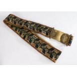 Mid 19th century long tapestry servants’ bell pull with brass rose and scroll cast handle, 238cm