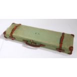 Green canvas and brown leather mounted shotgun case, the lid initialled R.C. the red velvet lined