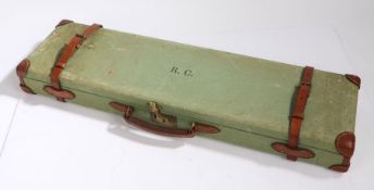Green canvas and brown leather mounted shotgun case, the lid initialled R.C. the red velvet lined