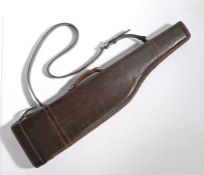 Leg of mutton gun case, the brown leather case with carrying handle and strap, 75cm long