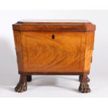 A good George III mahogany cellarette/wine cooler, the sarcophagus shaped body with a hinged lid