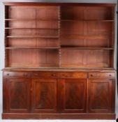 Victorian mahogany open bookcase cabinet, the concave cornice above adjustable shelves and a base