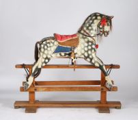 Victorian piebald rocking horse, the painted body with horsehair mane and tail, raised on a pine