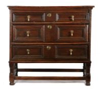 Charles II oak geometric chest of drawers, circa 1680, the rectangular top above three long