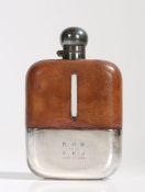 Early 20th Century silver plate and brown leather mounted glass hip flask, the plated bayonet