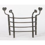 17th Century style fire guard, the arched frame with hearts to the rare and pointed finials to the