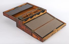 19th Century tortoiseshell mounted writing slope, the hinge lid opening to reveal a stationary