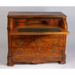 Victorian walnut secretaire chest of drawers, the rectangular top above a shaped drawer containing a