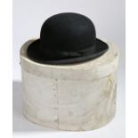 Lock & Co. bowler hat, formerly the property of Baron R. Beck, housed in a cardboard hat box with