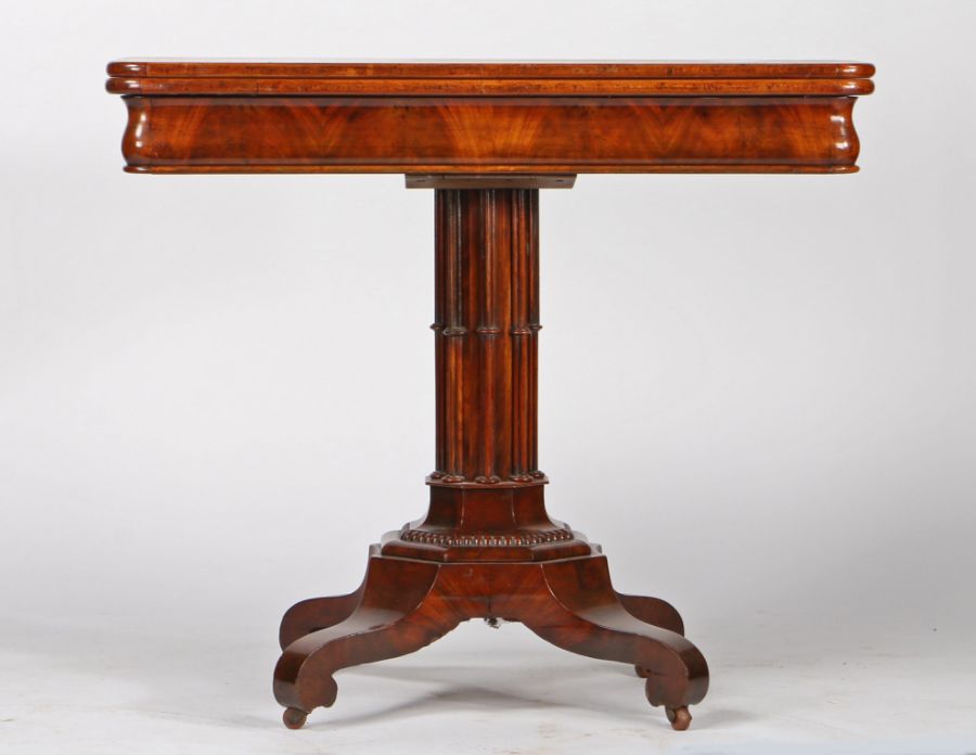 Victorian mahogany card table, the quarter veneered rectangular top with rounded corners opening