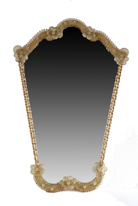 An Italian wall mirror, the shaped mirror plate with a twisted frame and flower heads, 41cm wide,