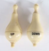 A pair of early 20th century pear-shaped electric servants’ bell pushes marked ‘up’ and ‘down’ for