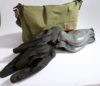 Eleven pigeon decoys and four crow decoys, housed in a green canvas game bag (qty)