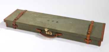 20th Century green canvas and brown leather mounted shot gun case, the lid initialled G.P.B. the red