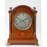 Late Victorian mahogany and marquetry inlaid mantel clock, the arched case with orb form brass