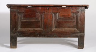 18th Century and later oak coffer the hinged lid opening to reveal an interior candle box, the front