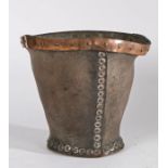 19th Century leather fire bucket, the copper riveted rim above a tapering black leather body, 23.5cm