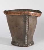 19th Century leather fire bucket, the copper riveted rim above a tapering black leather body, 23.5cm