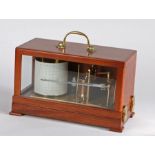 Mahogany and glass cased small brass barograph by the Gluck Barograph and Recorder Company Ltd. 32cm