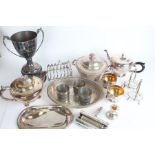 Silver plated ware to include trophy cup, tureen and cover, toast rack, condiment set, teapot