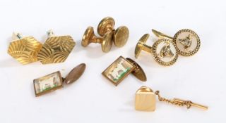 A selection of yellow metal costume cuff links. Gross weight 35 grams.