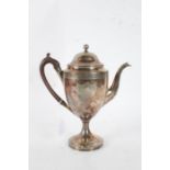 19th Century Sheffield plate coffee pot, the domed cover above a tapering body with crest, 27cm