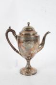 19th Century Sheffield plate coffee pot, the domed cover above a tapering body with crest, 27cm