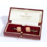 A pair of 9 carat yellow gold cuff links. UK hallmarked F. Birmingham. Approx 1.5 inches in