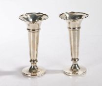 Pair of George V silver spill vases, Sheffield 1918, maker Walker & Hall, the shaped flared rims