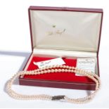 A graduated double row Elite Royal pearl necklace with a sterling silver clasp. Size from: 4 - 8.