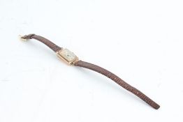 A 9 carat yellow gold ladies Audax dress/cocktail watch. Brown seiko watch straps. Weighing 10