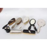 Silver handled and mounted dressing table items, to include hand mirror and brush initialled LER,