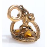 A 9 carat yellow gold citrine fob with pendant bale. Approx measurements: 2 x 3.5cm. Weighing 6.60