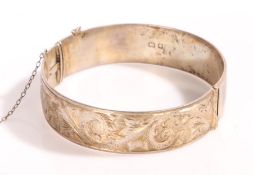 A sterling silver ornate bangle engraved 'Kathleen'. UK hallmarked. Diameter 2.5 inches.  Weighing