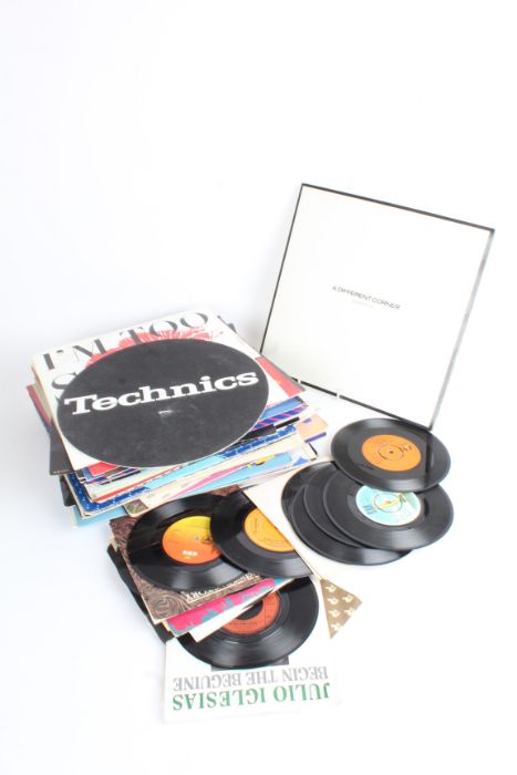 Collection of approx. 45 mixed 12" singles, approx. 20 7" singles, and a Technics slipmat