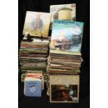 A huge collection of Country music on vinyl. Approx. 400 LPs, approx. 60 7" singles and 15 box