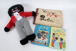 Two Enid Blyton books to include 'Hurrah For Little Noddy', another by Florence K. Upton, and a '