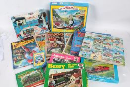 Collection of Thomas the Tank Engine puzzles, a Thunderbirds puzzle and six editions of Shoot