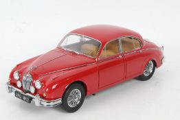 A Model Icons Jaguar Mark II, 1:18 scale in red, 26cm long