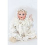 Heubach Koppelsdorf bisque headed doll, with sleeping blue eyes, 30cm long