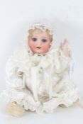 Heubach Koppelsdorf bisque headed doll, with sleeping blue eyes, 30cm long