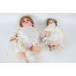 Heubach Koppelsdorf bisque doll, with brown eyes, 44cm long, together with one other bisque doll,