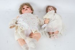 Heubach Koppelsdorf bisque doll, with brown eyes, 44cm long, together with one other bisque doll,