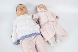C and D dress doll, with blue eyes, together with one other doll, marked to the neck but