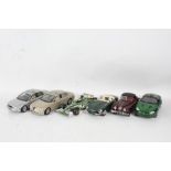 A Beanstalk Group Jaguar XKR 1/18 scale in green, Maisto Jaguar X-Type 1/18 scale in silver,