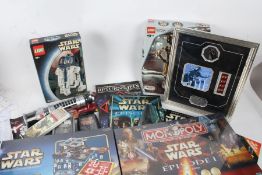 Collection of Star Wars memorabilia, to include Lego R2-D2 and C-3PO, Tazo collector's pack, Star