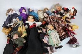 A large collection of 20th century dolls some bisque headed dolls together with various others to