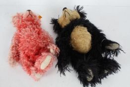 Steiff bear, with pink fur, 28cm long, together with a Ruben black and white bear with large snout